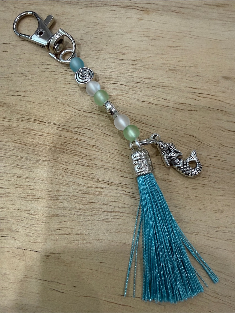 Turquoise Tassel “Clip It “with Mermaid Charm